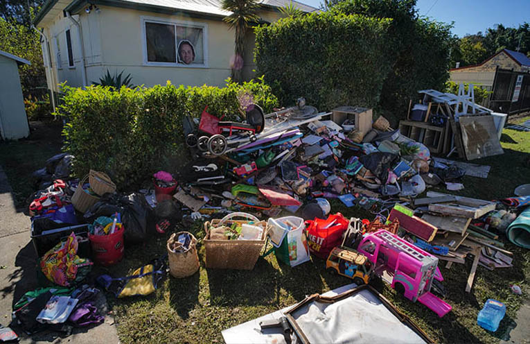 Police warn against looting in flood-stricken towns