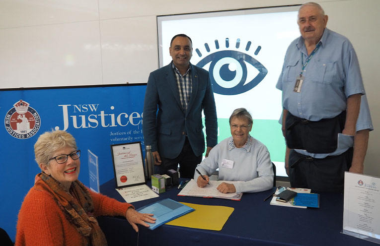 Coffs Harbour MP joins the team at the JP community desk at Park Beach Plaza