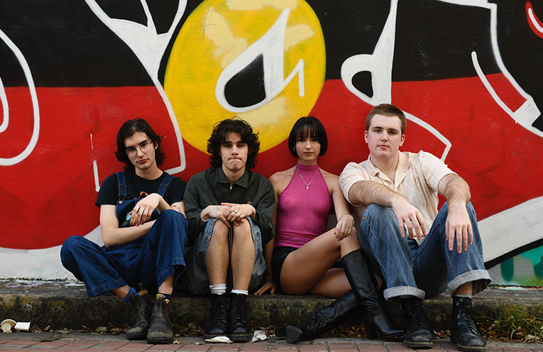 Coffs band Purple Disturbance signed by music agent