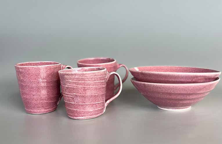 Pink pieces of pottery by Clare Danby.