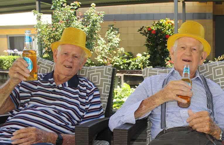 Coffs Haven twins Brian and Colin mark their 90th birthday with low-alcohol beer