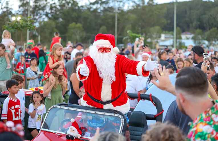 The arrival of Santa Claus sent children into a frenzy.