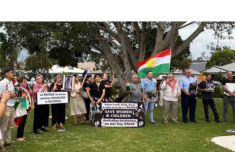 Community members gathered in Brelsford Park on 1 February to raise awareness of humanitarian issues. Photo: supplied.