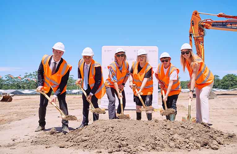 Head of Development Simon Burk, Communities CEO John Carfi, Mayor Nikki Williams, residents Lyn Wilson and Kate Turner, and Development Manager Anna Cunningham.