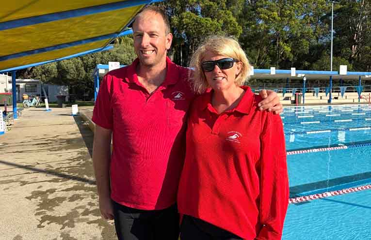 Richie Goddard with swim coach Kim Roach.