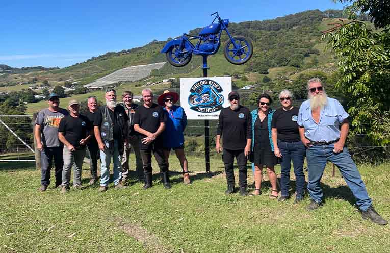 Members of the Blue Motorcycle Project meet to launch the bike they affectionately call ‘Red Hill Rat’.
