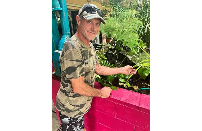 Dave Gentle with one of his tadpoles. Photo: Kate Pye.