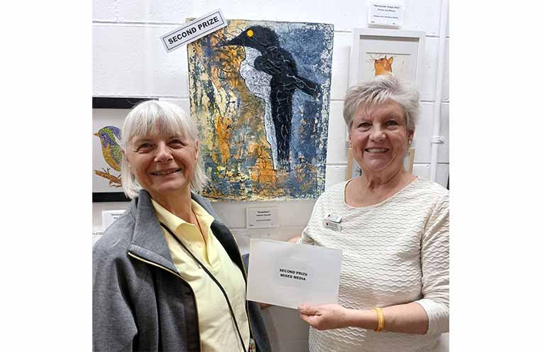 Second Prize Mixed Media winner Isabella Brandli with Neighbour, presented by CHCAG President Sue Roberts.