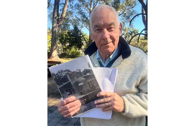 Coffs Harbour Bridge Club President Barry Butler with the club’s history catalogues. Photo: Andrea Ferrari.