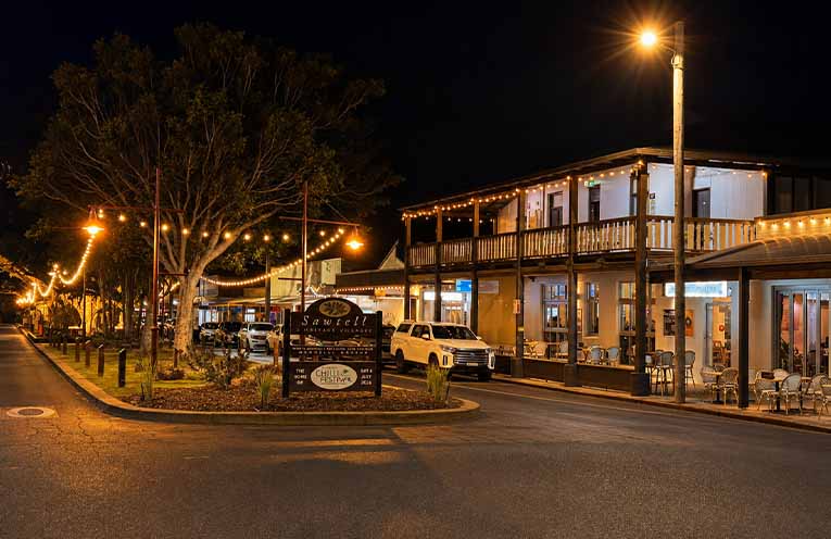 Sawtell village under the soft glow of the newly installed festoon lights.