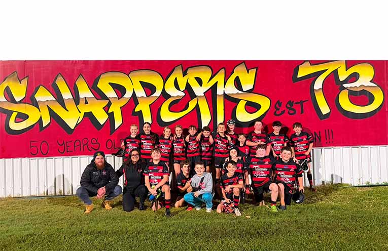 Snappers under-11s (in front of the sign) and Snappers under-12s – both grand final-bound. Photos: Supplied by the club.