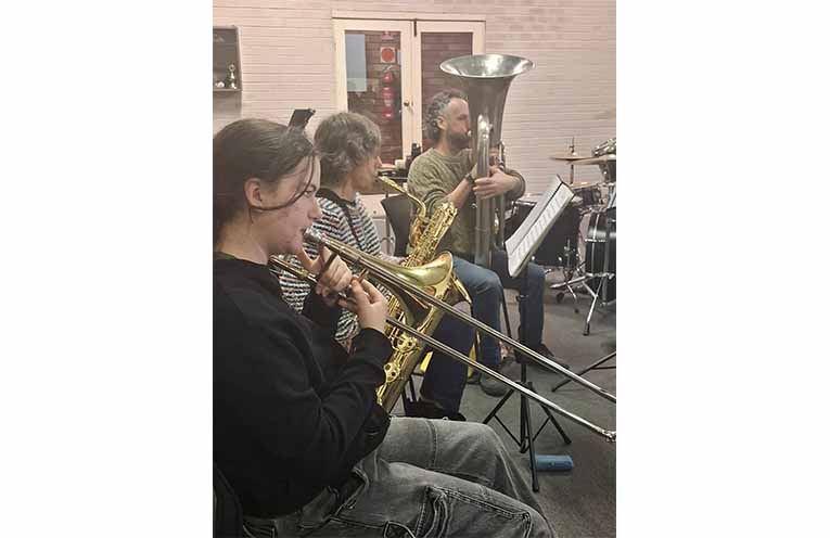 Zara, Jen & Paddy performing.