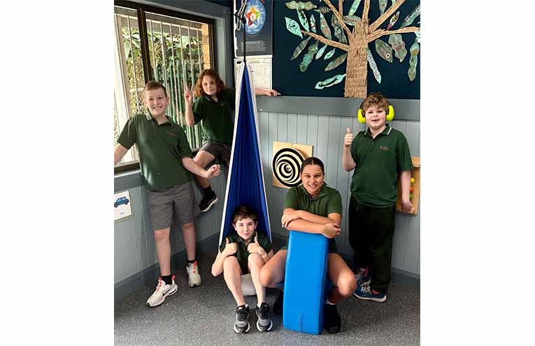 Aspect Macarthur School students with the new play equipment donated by Rotary Club of Sawtell.
