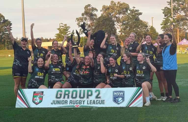 The Sawtell Panthers under-17s Girls celebrate their grand final win.