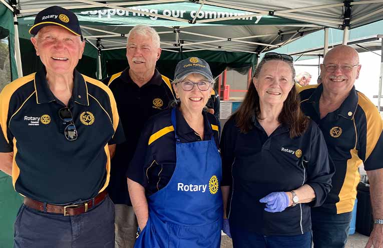 Rotary clubs united at the BBQ: Sawtell Rotary’s John Turner and Bruce Hall, Coffs Harbour Rotary’s Glen James, Woolgoolga Rotary’s Alison Ratliff, and Sawtell Rotary’s Peter Paff.